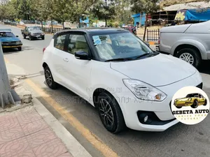 Photo - Suzuki Swift 2021 White