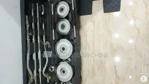 Photo - ሁለገብ ዳምፔል እና ባርቤል Adjustable Dumbbell and Barbells