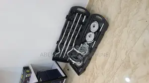 Photo - 50 KGS Adjustable Dumbbells and Barbells