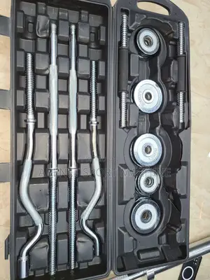 Photo - አዲስ የገባ ዘመናዊ Adjustable Dumbbell and Barbells