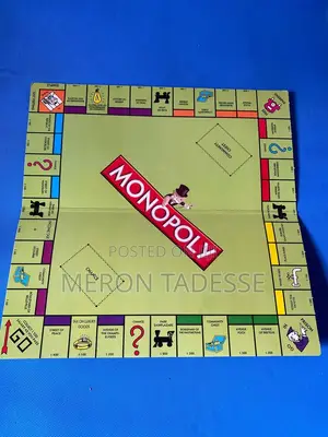 Photo - Monopoly +Snakes Ladder Game in the Boxes.