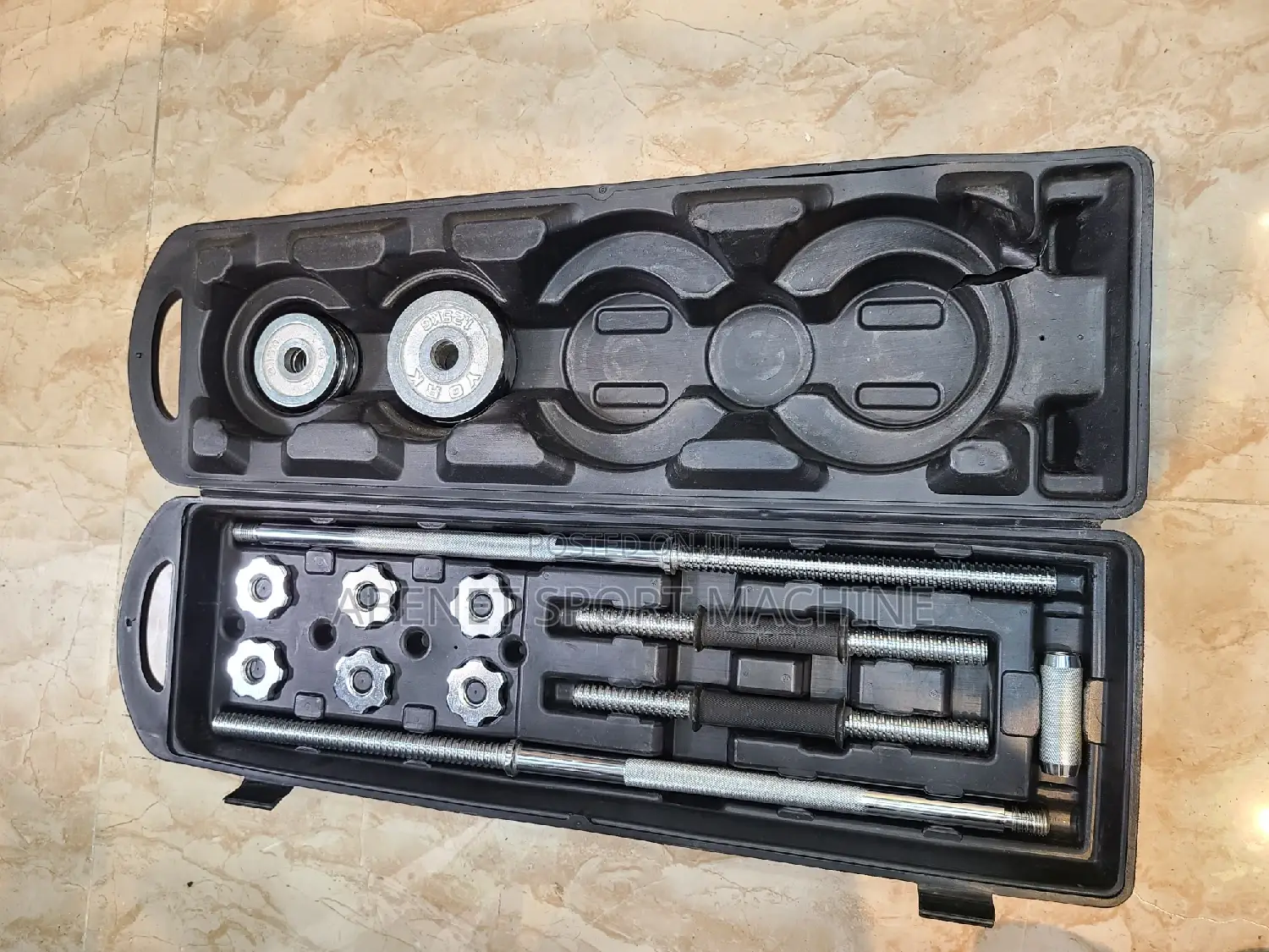 በቤቶ ዉስጥ ስፖርት የሚሰሩበት ዘመናዊ ዳምፔል እና ባርቤል