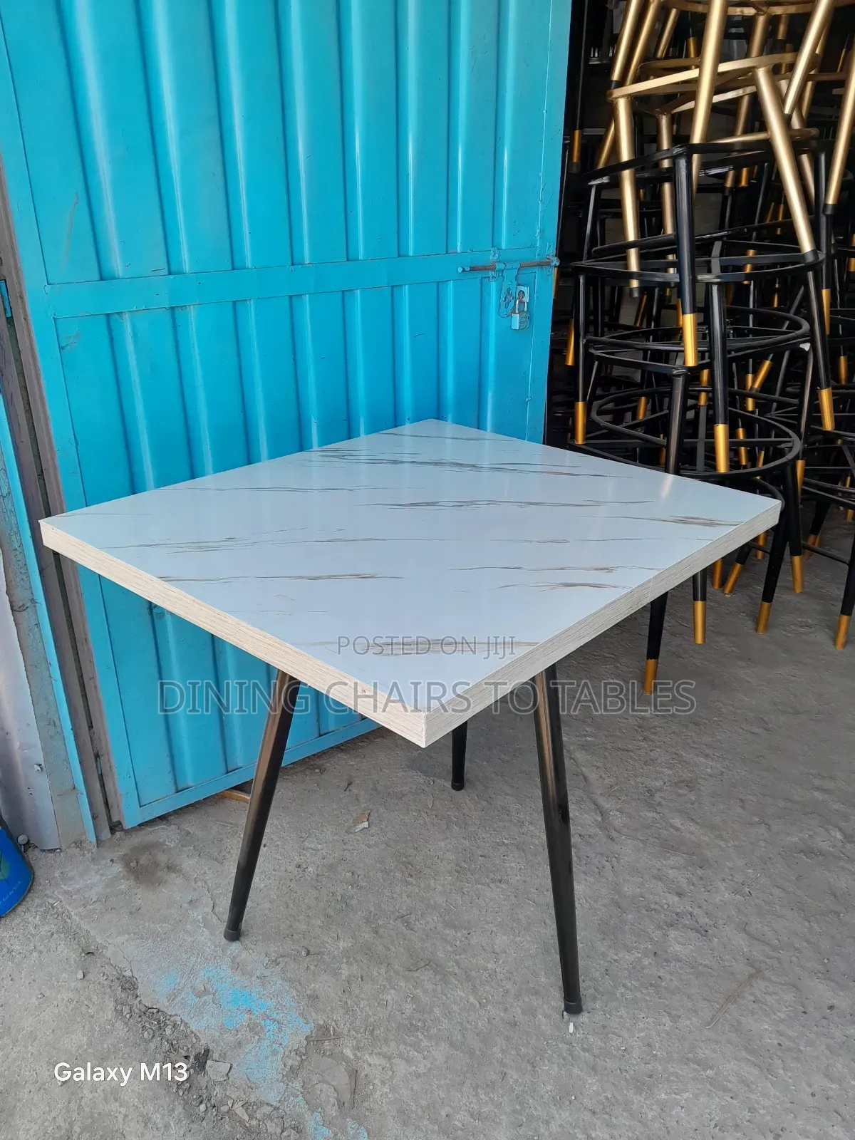 Dining Table With Metal Legs and MDF Laminate