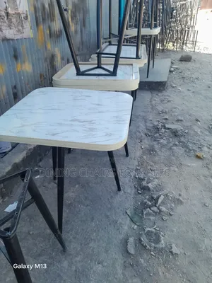 Dining Table With Metal Legs and MDF Laminate