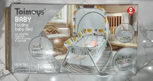 Photo - Baby Folding Baby Bed