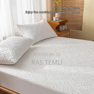 Photo - ውሃ የማያስገባ የፍራሽ ልብስ(ለ2-ሜትር አልጋ)