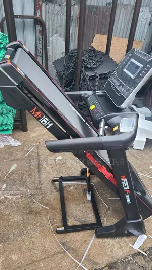 Photo - በቤቶ ለመሮጥ የሚሆን Miracle Fitness Treadmill