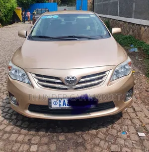 Photo - Toyota Corolla 2010 Gold