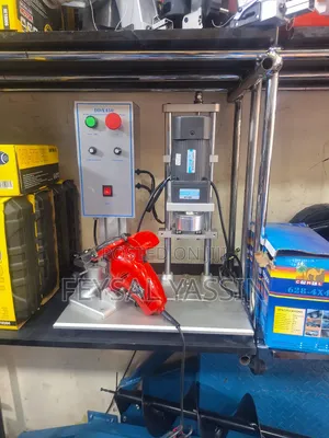 Photo - የሀይላንድ ማሸጊያ ማሽን Auto Bottle Cap Sealing Machine