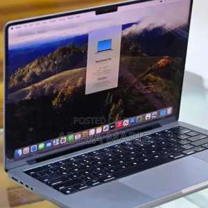 Photo - New Apple MacBook Pro 2023 M3 14-Inch 18GB Apple M3 Pro SSD 512GB