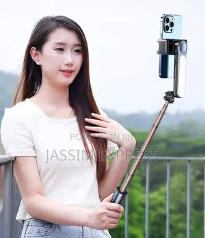 360° የሚሽከረከር Gimbal Stabilizer With Fill Light and Tripod