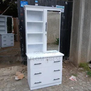 Photo - ቁመት 1,70 Cm ድሬሲንግ