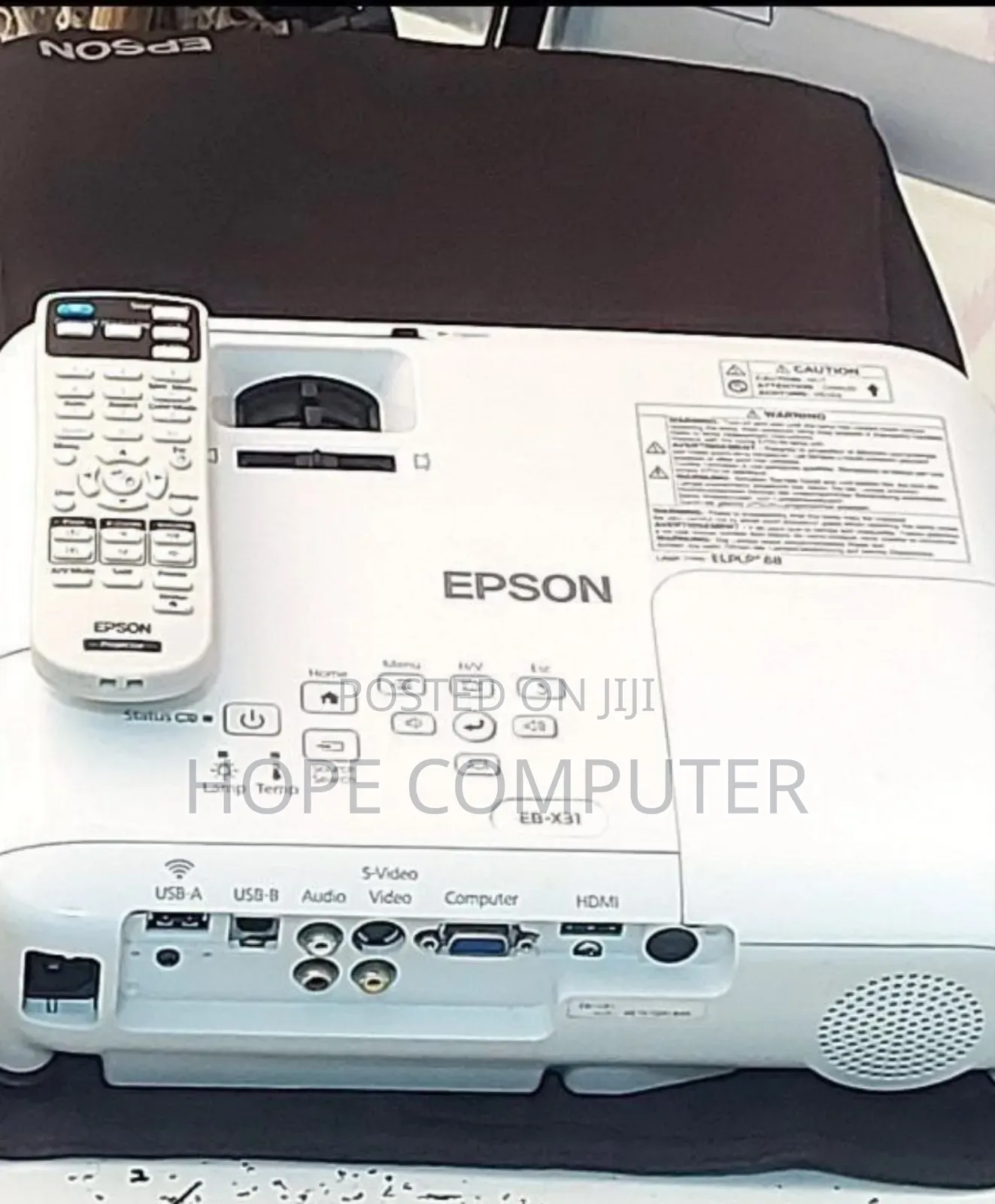 Epson Projector Model Name: Eb-X31 Has : Remote