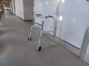 Photo - Foldable With Wheel Walker Pin Pressed Folding Walker New