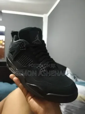 Photo - Black Cat Jordan 4