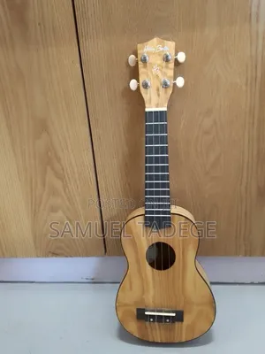 Photo - Guitar Ukuleles