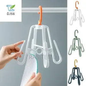 Photo - Multifunctional Rotating Shoes Drying Rack
