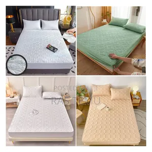 Photo - Waterproof Bed Cover እርጥበት የሚከላከል የፍራሽ ልብስ