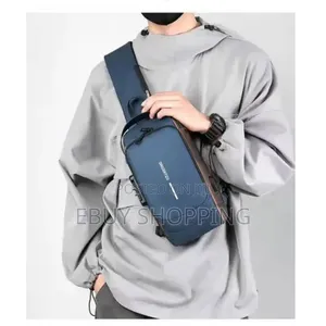 Photo - **Unisex Crossbody Bag – Spacious Secure for Essentials**
