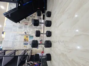 Photo - ዘመናዊ Hex Dumbbells በቤቶ ስፖርት ለመስራት