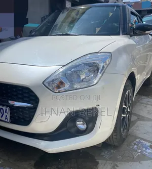Photo - Suzuki Swift 2022 White