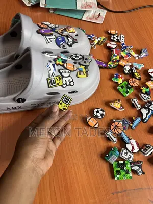 Photo - Crocs Stickers / Shoe Charm የጫማ ማስጌጫ Price 1500 for a Dozen