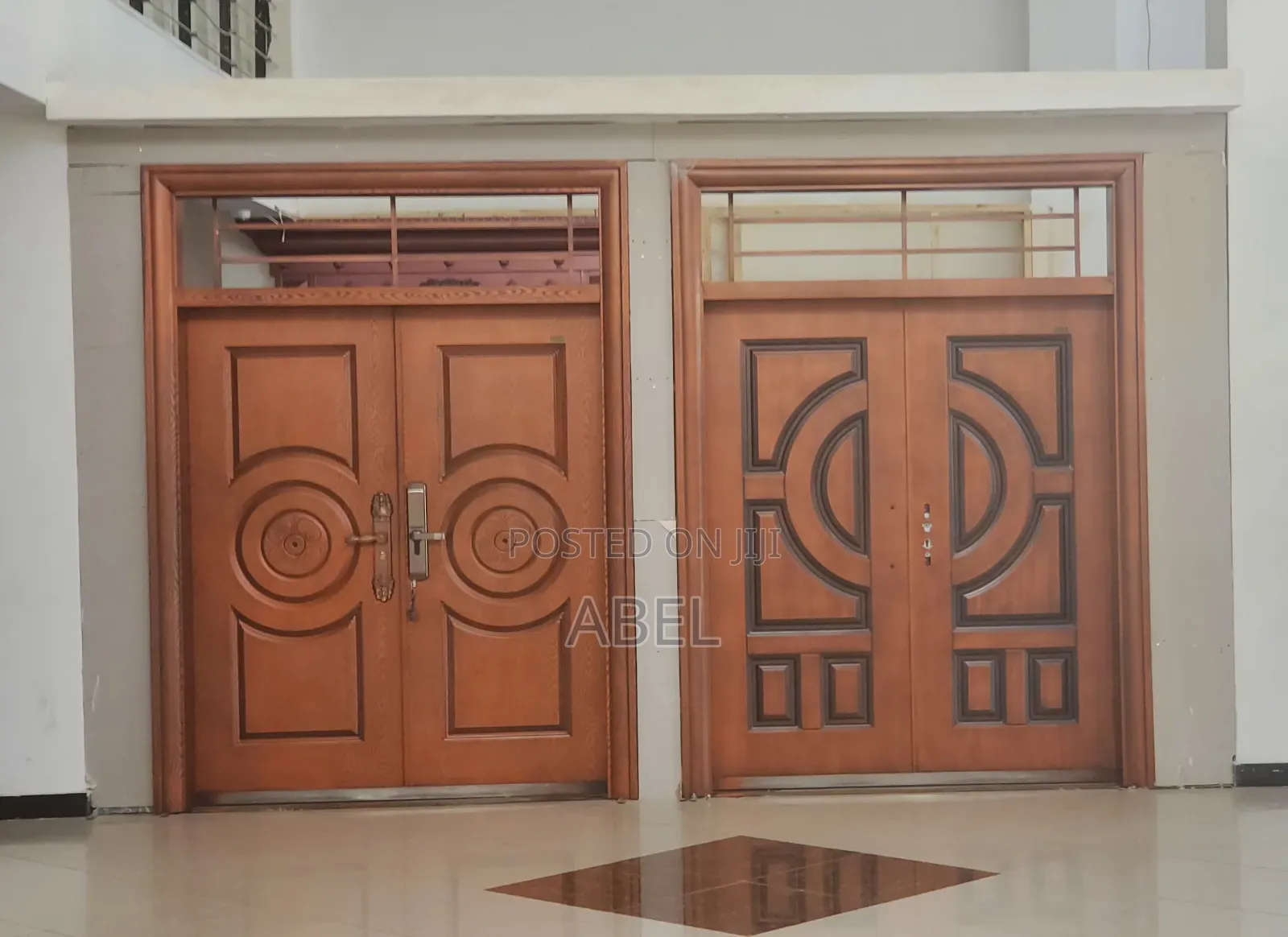 Metallic Doors PLC