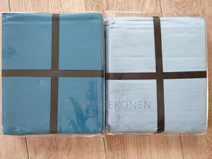 Photo - Bed Sheet and Mattress Protecter