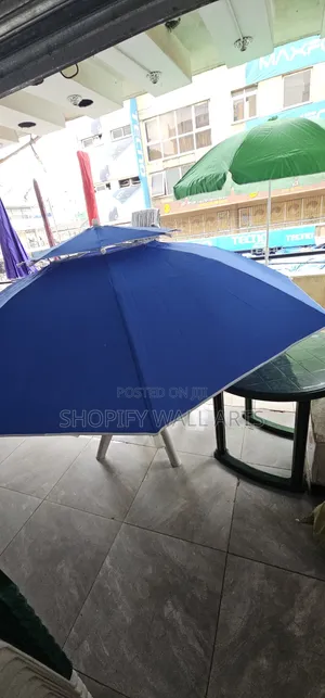 Photo - Plastic Chairs and Umbrellas