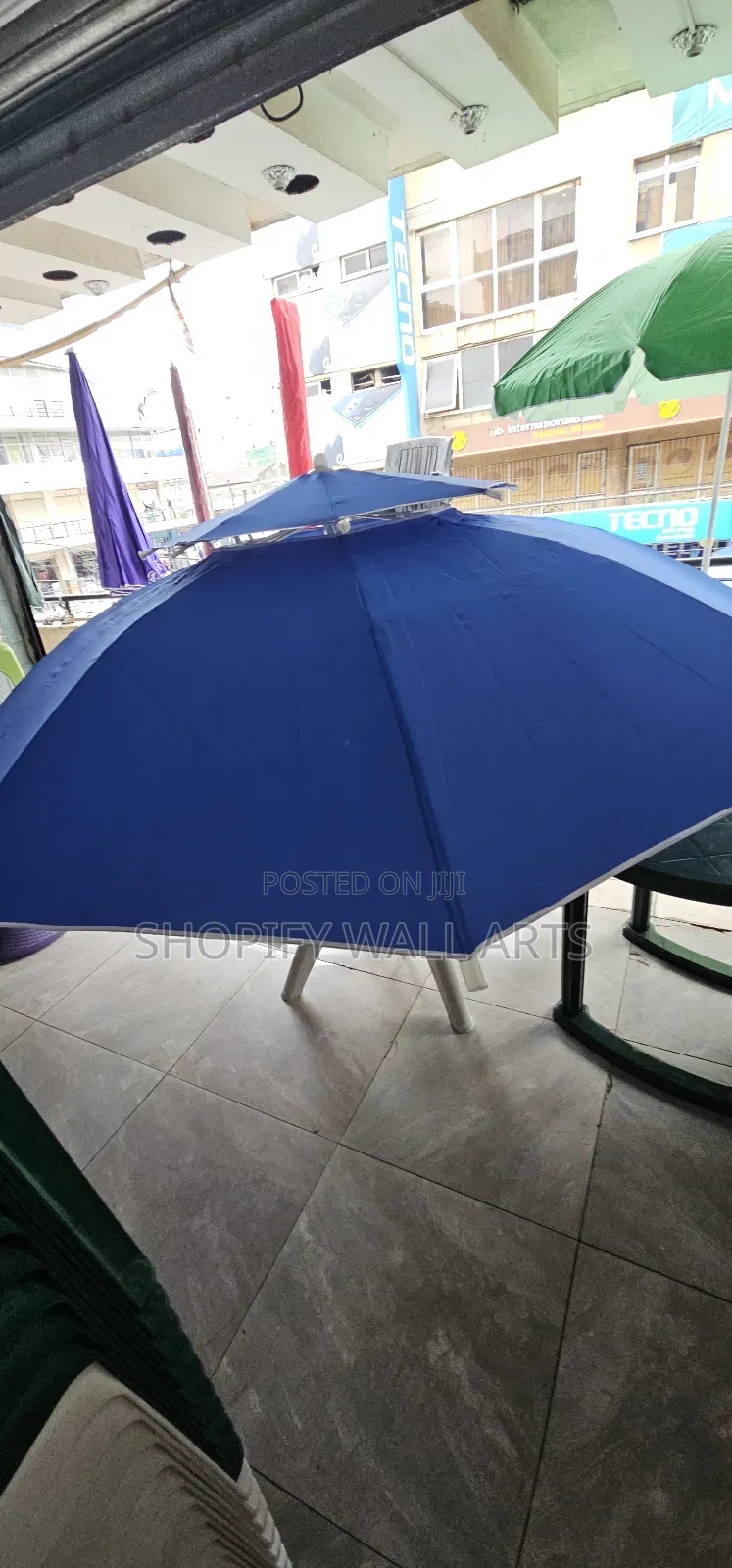 Plastic Chairs and Umbrellas