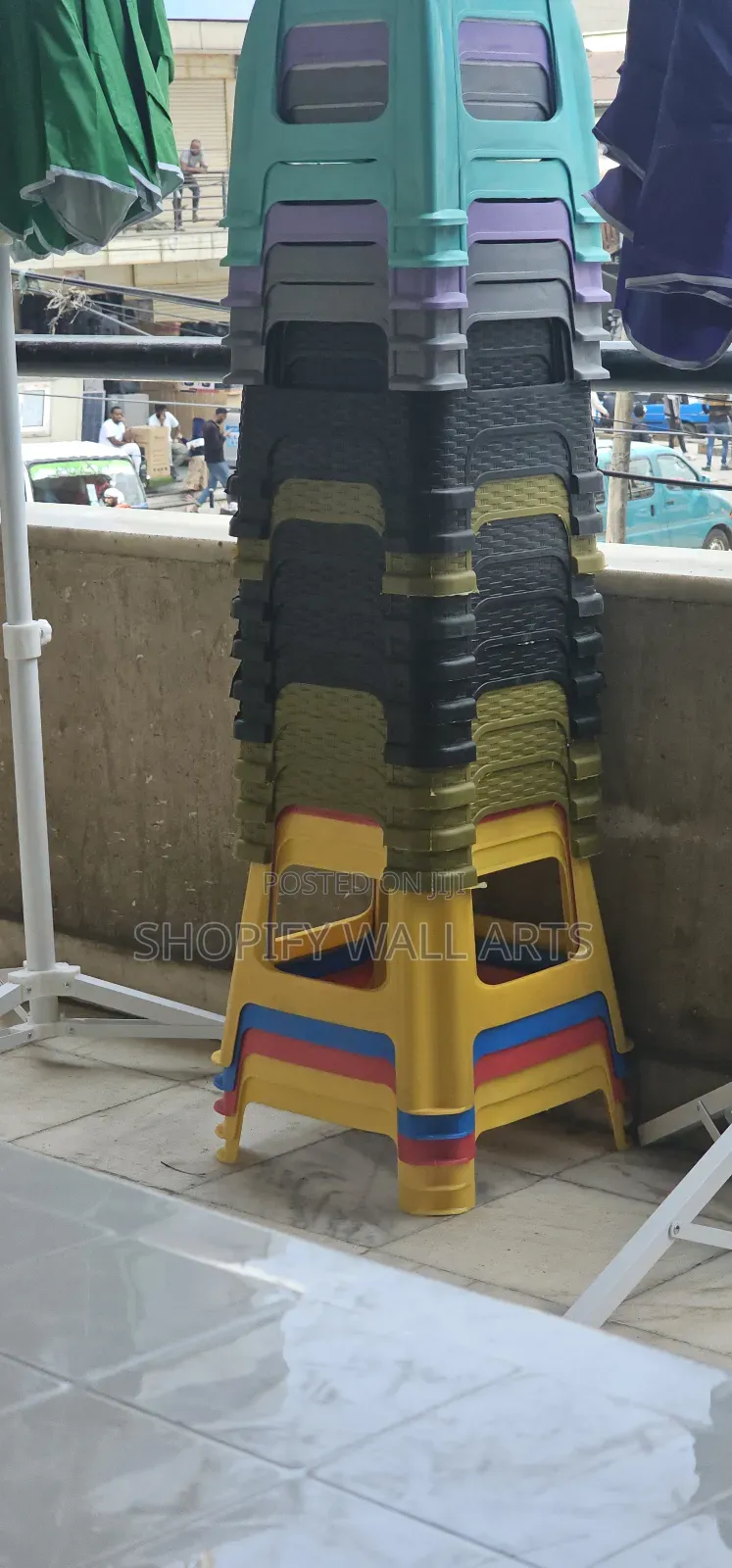 Plastic Chairs and Umbrellas