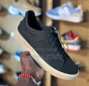 Photo - Cat Grandpro Low Top Casual Men’S Leather ‘Black/White’ Shoe