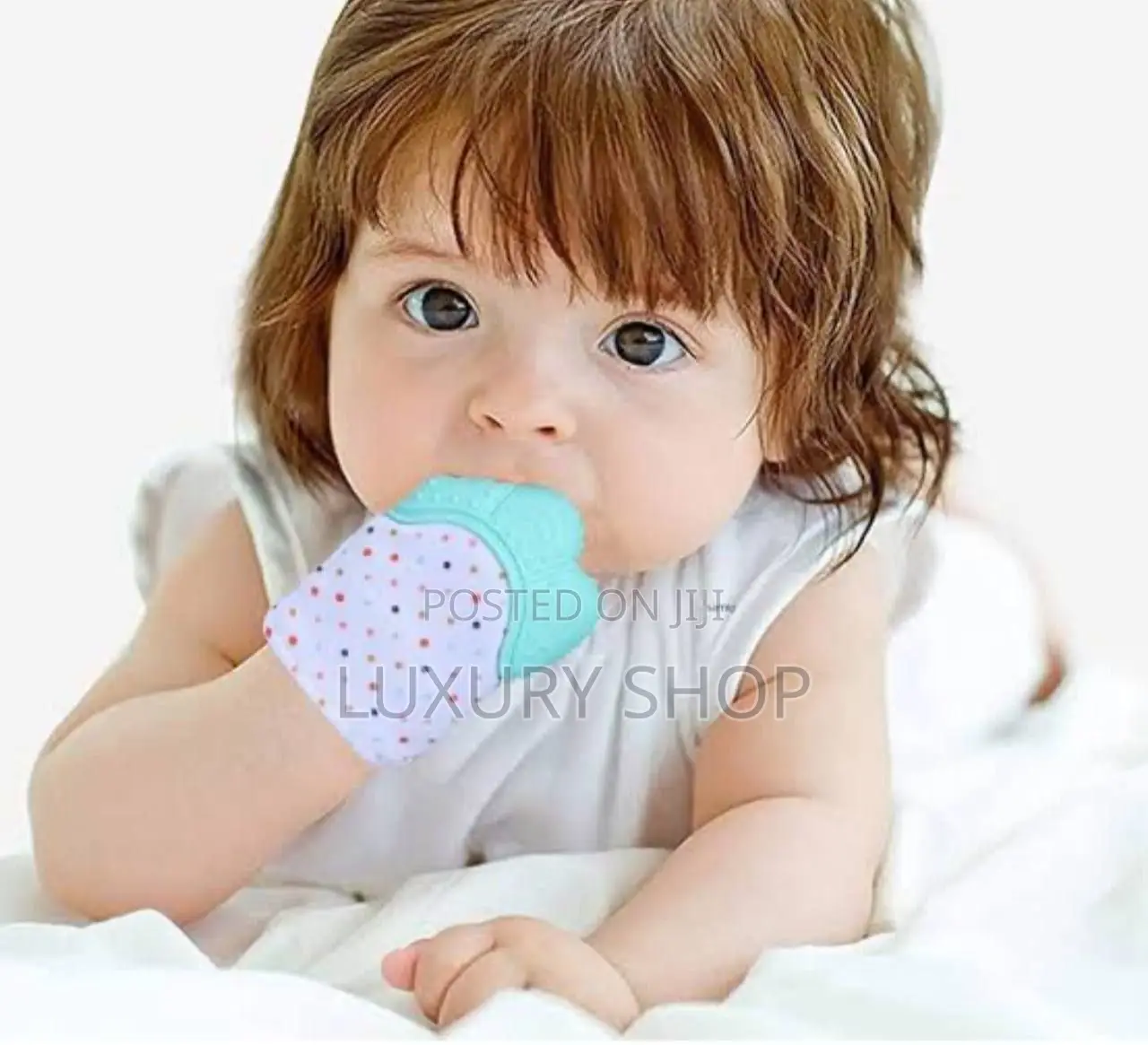 እጅ ላይ የሚታሰር የድድ ማከክያ