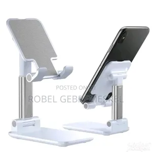 The Image Shows a White Folding Desktop Phone Stand