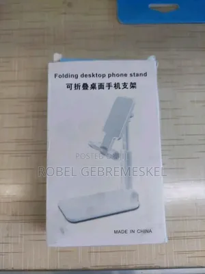 The Image Shows a White Folding Desktop Phone Stand