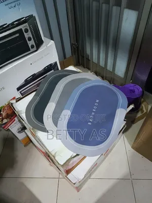 Photo - የበር/የሻወር ቤት ምንጣፍ)