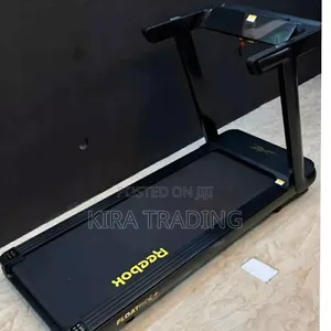 Photo - ለቤት ውስጥ የሚሆን የመሮጫ ማሽን