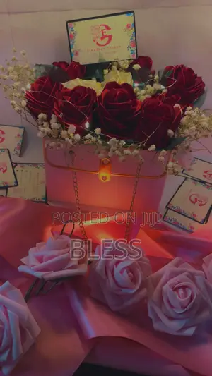 Red And White Ribbon Flowers With White Bag And Led Lights