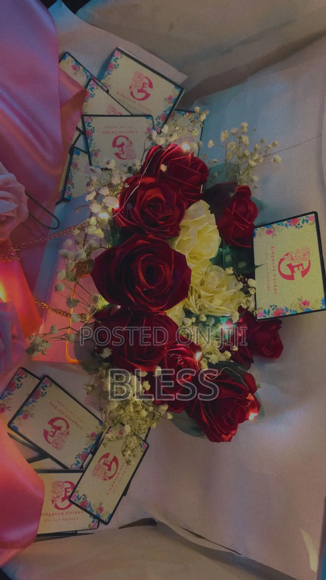 Red And White Ribbon Flowers With White Bag And Led Lights