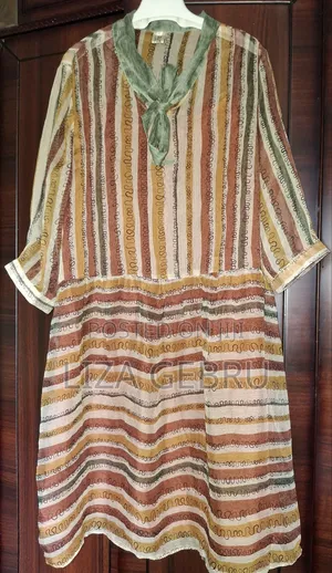 Photo - Slightly Used Like New Dress. Size S,M