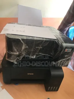 Photo - Epson Printer 100 Print ብቻ ያረገ