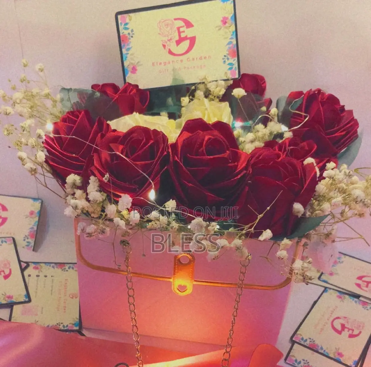 Red And White Ribbon Flowers With White Bag And Led Lights