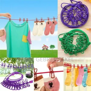 Photo - Portable Drying Rack Clips Cloth Hanger