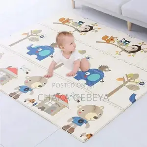Photo - ከለስላሳ ማቴርያል የተስራ ቅዝቃዜ ያማያሰተላልፍ Waterproof Kids Mat