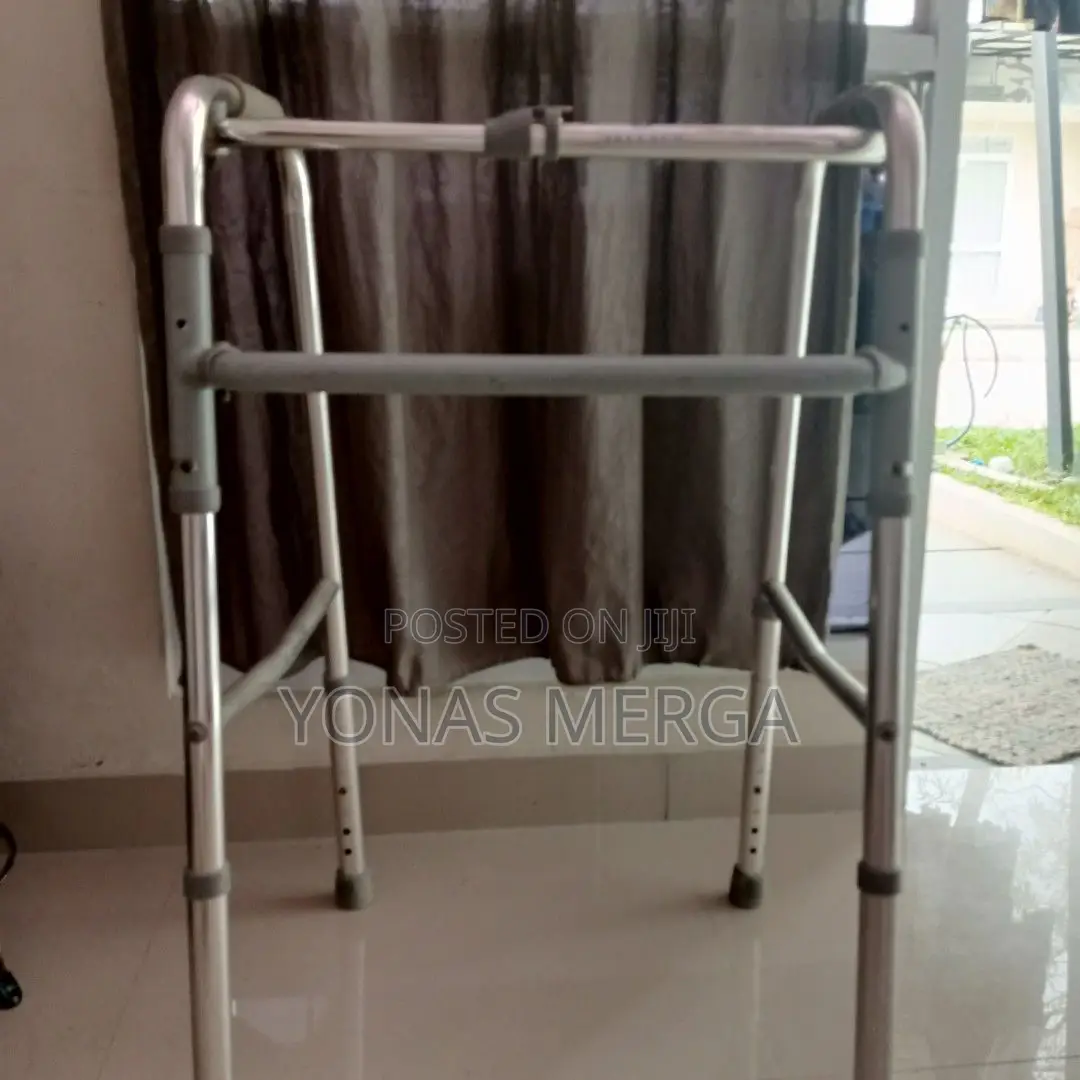 Folding Walker Press Botton at Middle Rod of Walker.