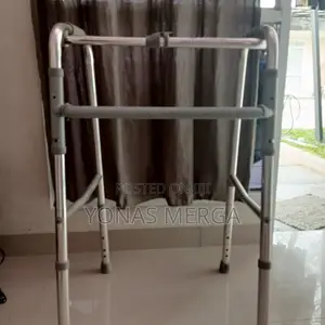 Photo - Folding Walker Press Botton at Middle Rod of Walker.