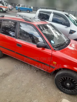 Photo - Toyota Corolla Hatchback 1990 Red