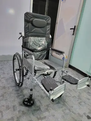 Toilet Wheelchair ፶ßis Foldable. Weight Capacity Is 150kg