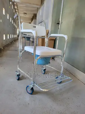Photo - Toilet/Adult Potty Chair Is Equipped With 4 Universal Wheels