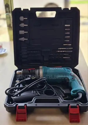 Bosch Drill With Accessories